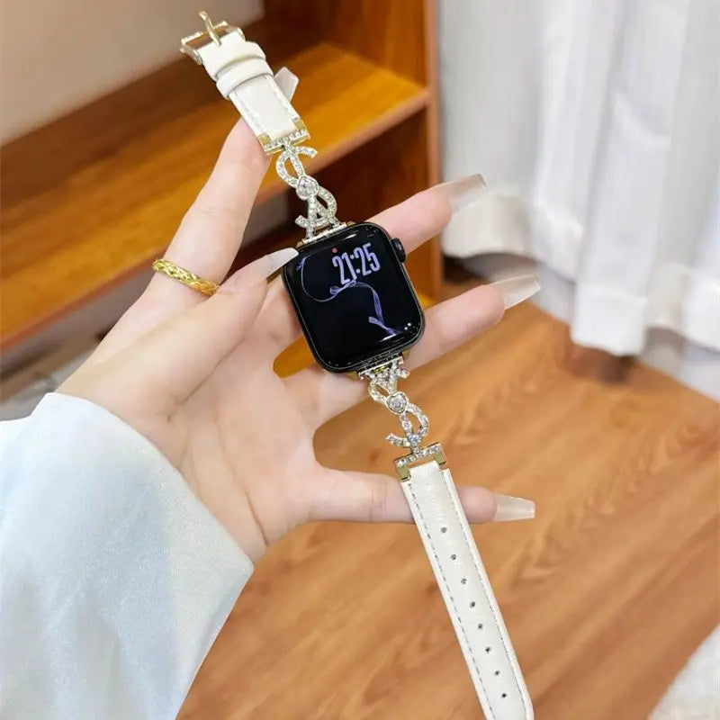“White leather Apple Watch band with silver S rhinestone connector – box view”
