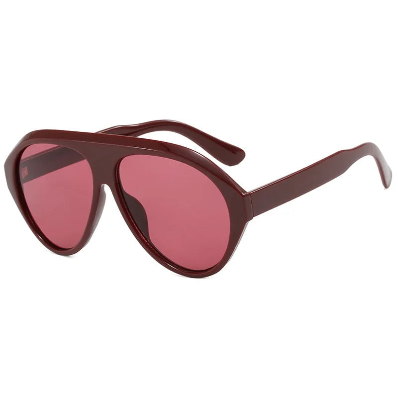 Sunglasses with red lenses and brown frame on a white background