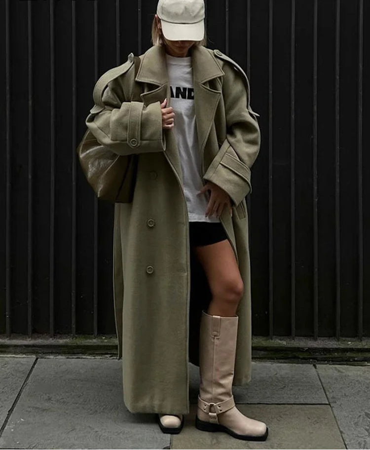 olive oversized long coat with belt and wide sleeves street style look