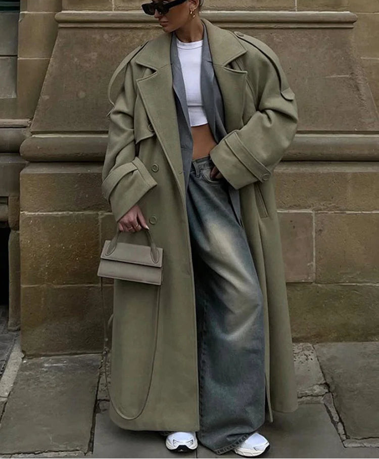 olive oversized long coat with belt and wide sleeves street style look