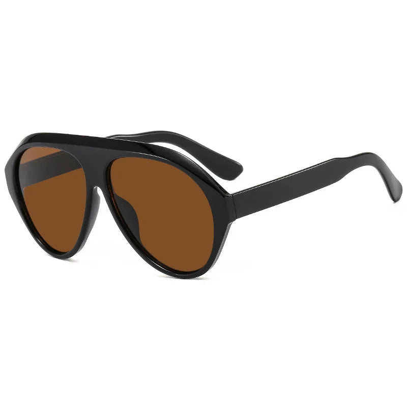Black sunglasses with brown lenses on a white background