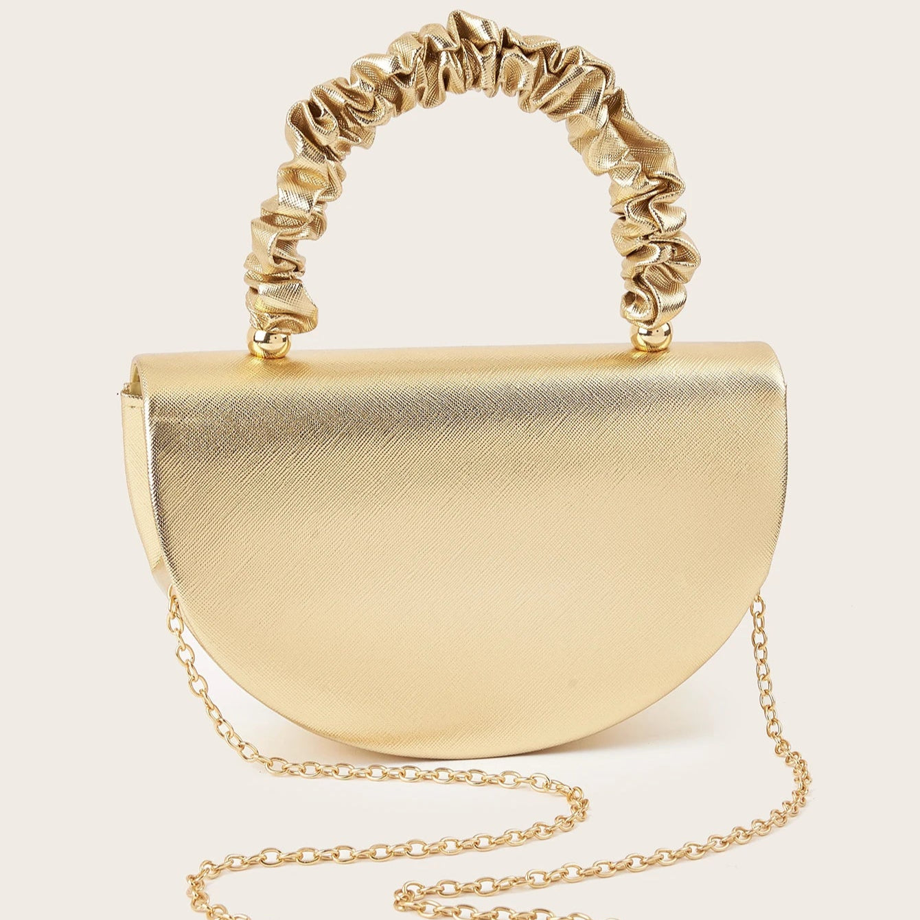 Gold ruched handle half-moon evening clutch, front view