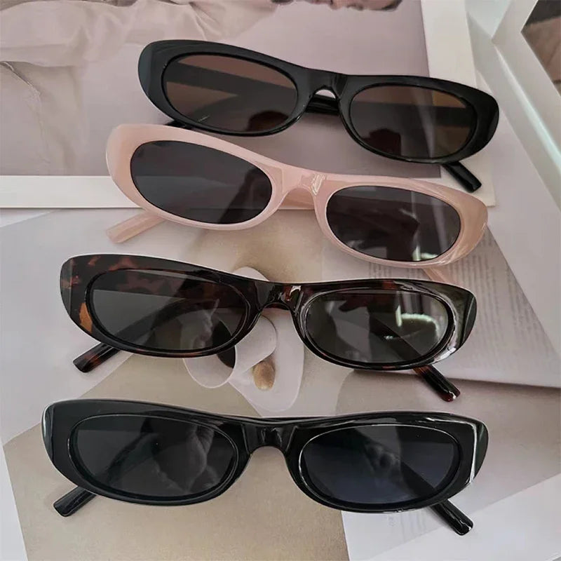 narrow rectangle cat eye sunglasses in glossy black with uv400 lenses