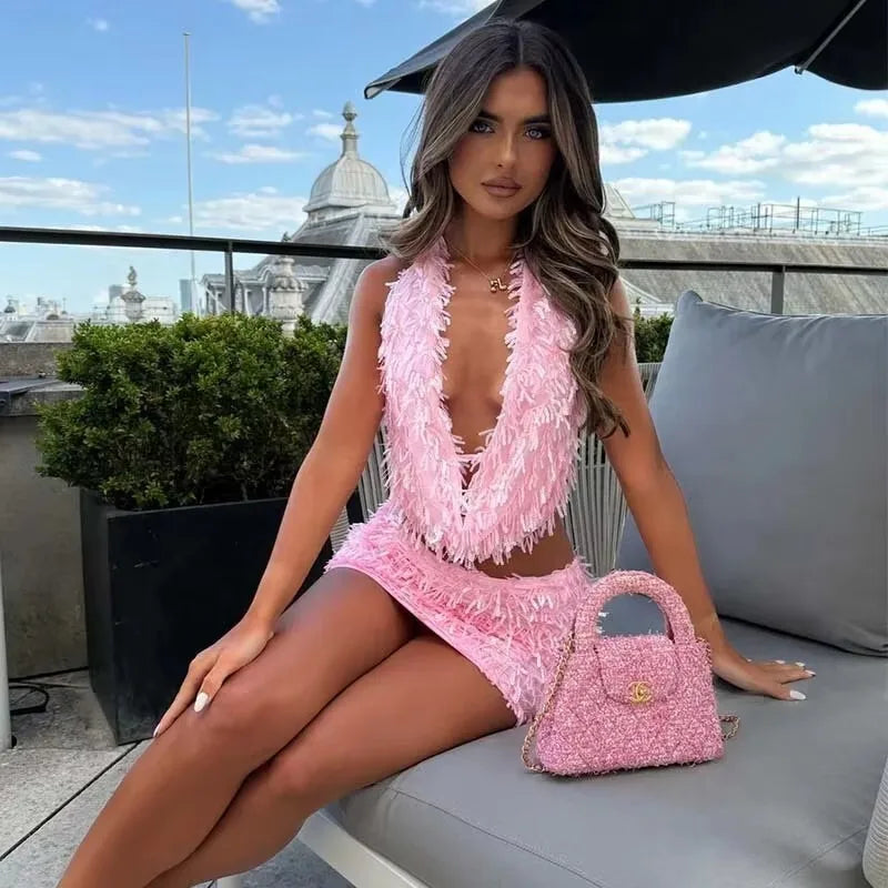 close up of floral sequin pattern on black mini party dress