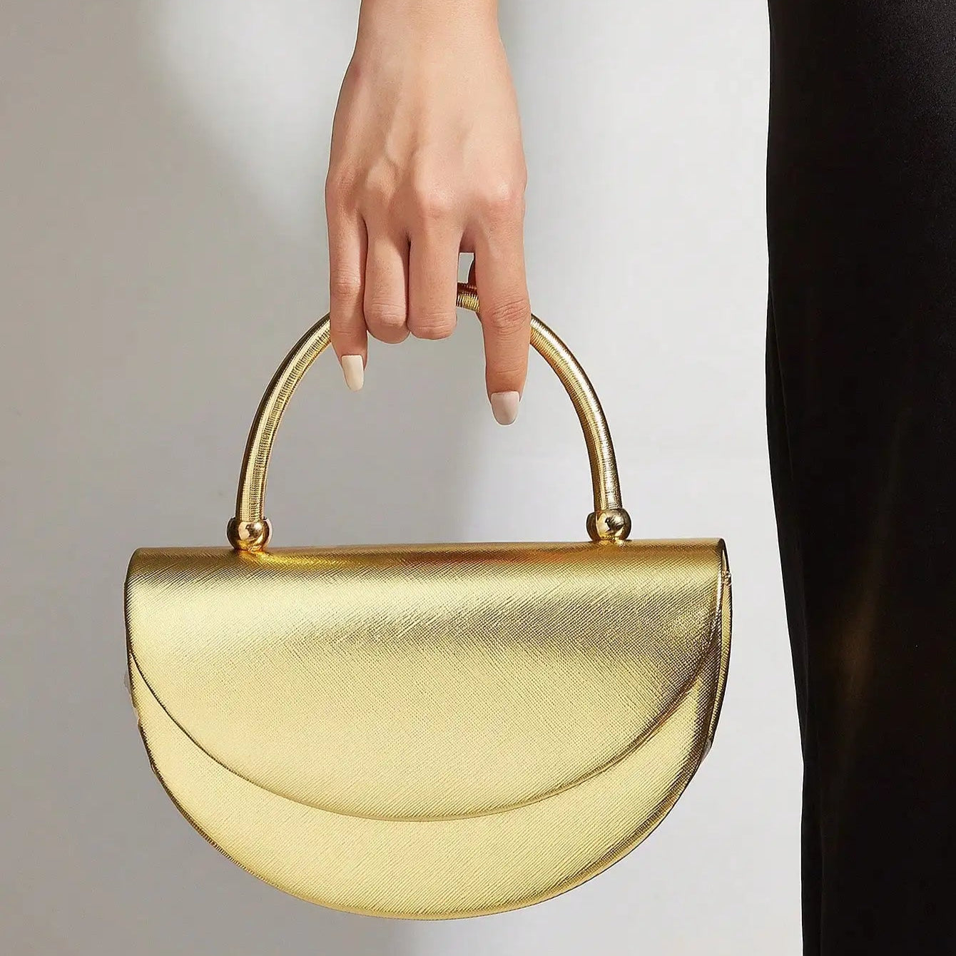 Gold ruched handle half-moon evening clutch, front view