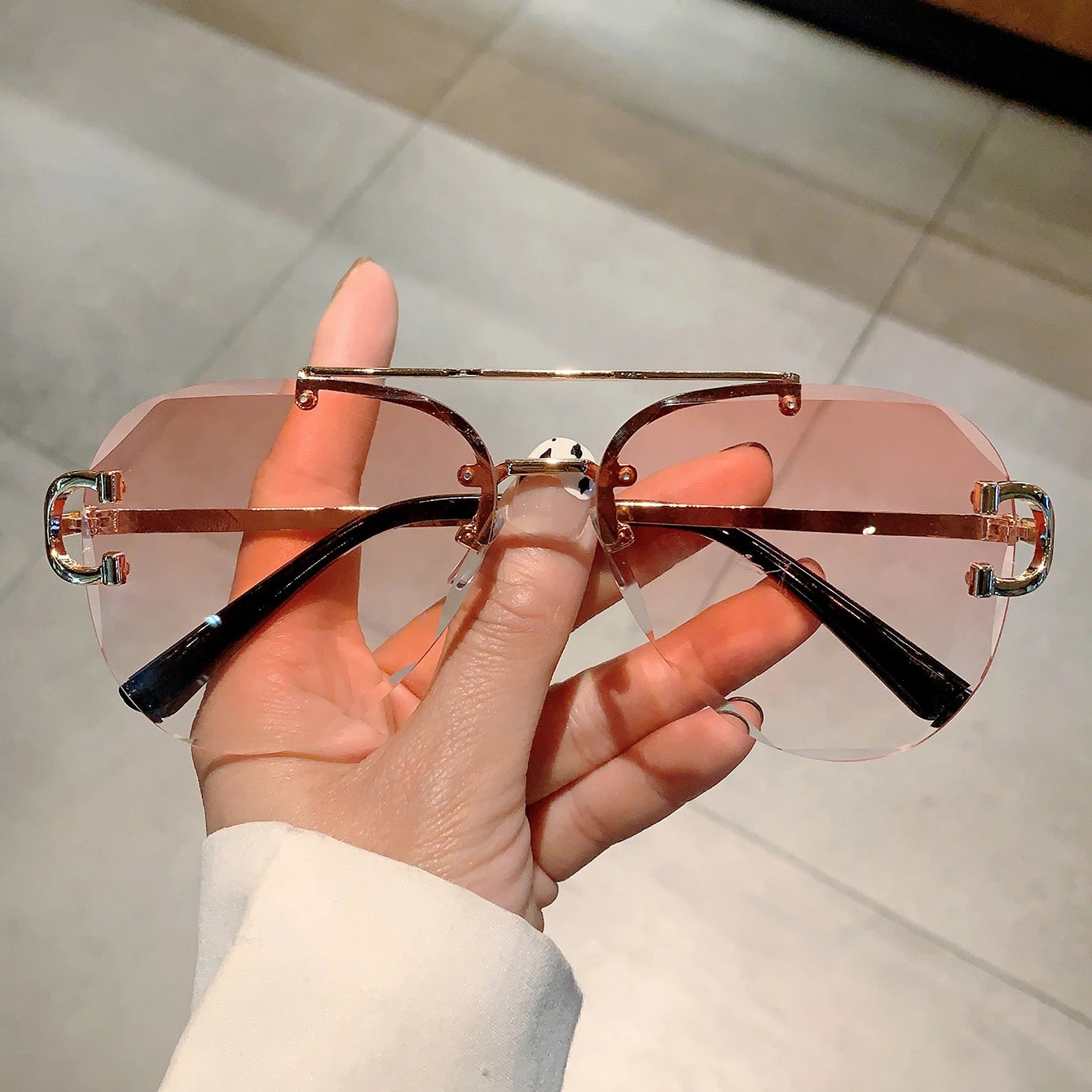 rimless aviator sunglasses with double bridge gold frame and black gradient lenses