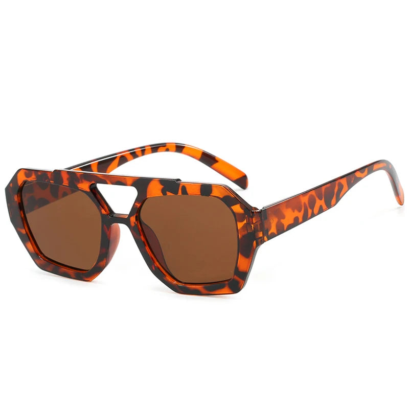 color lineup of oversized square sunglasses in black tortoise brown amber blue and rose