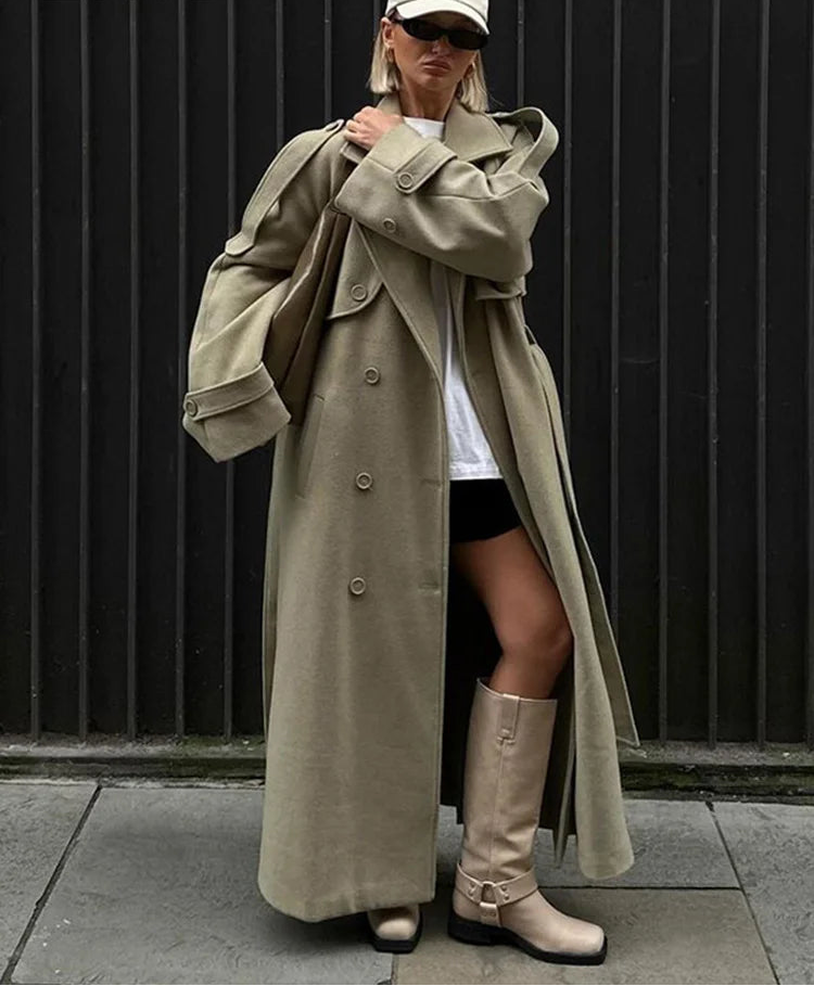 olive oversized long coat with belt and wide sleeves street style look