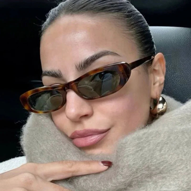 narrow rectangle cat eye sunglasses in glossy black with uv400 lenses